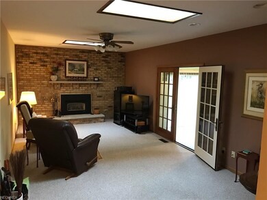 Nice sized family room with Skylights and gas fire