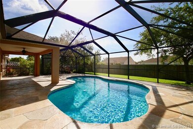 Pool with Covered Patio and Screen Enclosure
