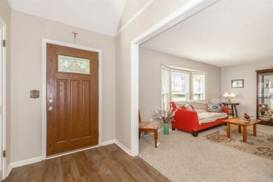 FRONT ENTRY WAY AND FORMAL LIVING ROOM