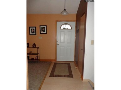 Entering the front door, the closet is on the righ