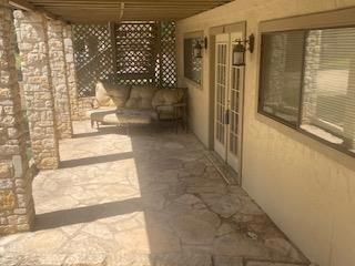 View of patio / terrace featuring french doors