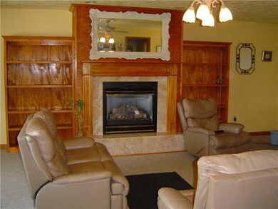 Family Room. X large Room with fireplace is width 