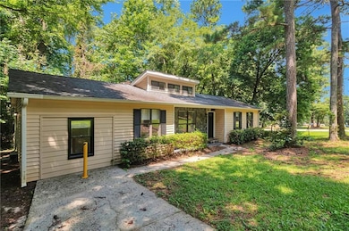 View of front of house featuring a front lawn