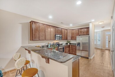 Kitchen view looking toward front door
