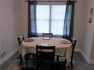 Dining room featuring baseboards