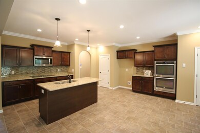 EXAMPLE>>>HUGE Country Kitchen with Island, Bar, Stainless Steel Appliances, Backsplash, Tile Flooring, TWO PANTRIES and Much More!! 