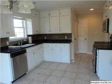 KITCHEN WITH NEW  SS APPLIANCES