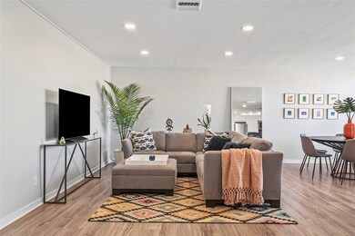 Main living area features deluxe wide plank luxury