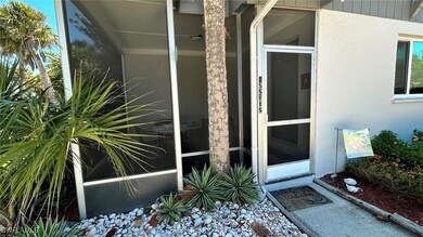 Doorway to property with stucco siding