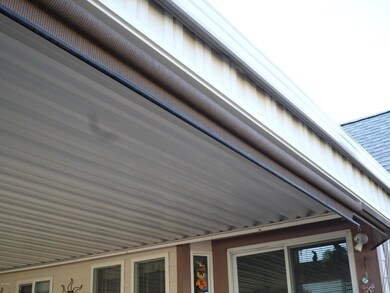 ROLL DOWN SUNSCREEN IN CARPORT