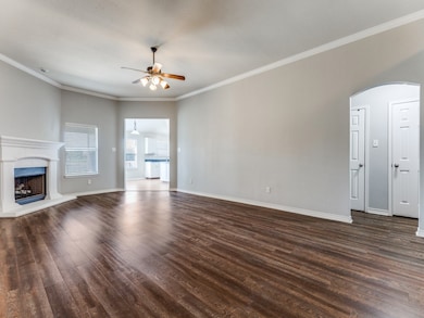 Living room opens to kitchen.