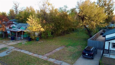 View of yard with covered porch