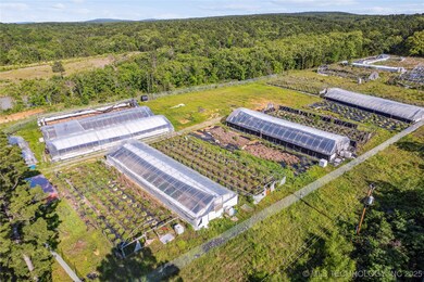Drone / aerial view of a heavily wooded area