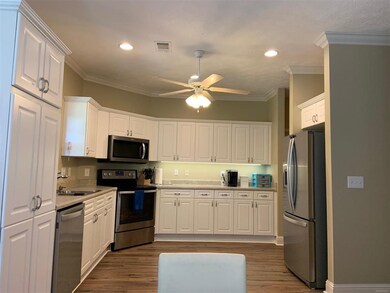 THE KITCHEN IS GOOD SIZED AND HAS GOOD RUNNING COU