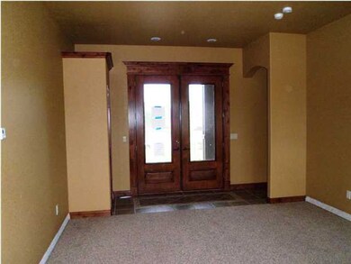 Another view of the living room looking back towar