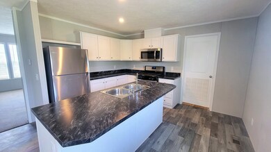 466 Montana unit 466, Belleville, MI 48111 - photo 3