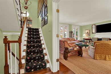 Front Hall has split level entrance and leads into