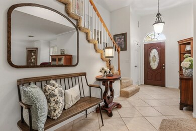 This welcoming entryway features a wooden front do
