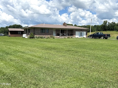 RIGHT FRONT VIEW WITH LOT