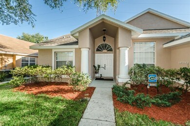 An impressive entry with fresh exterior paint, col