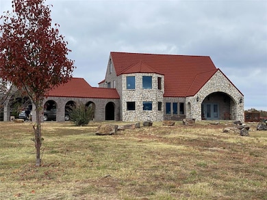 View of front of property featuring a front lawn