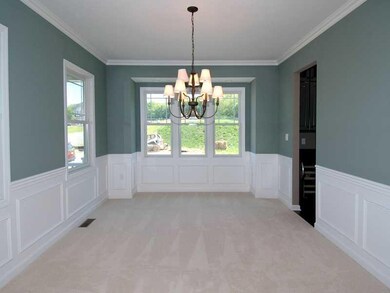 Dining Room. Formal dining with crown molding and 