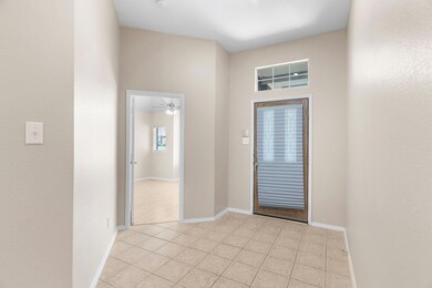 Tiled entryway with ceiling fan
