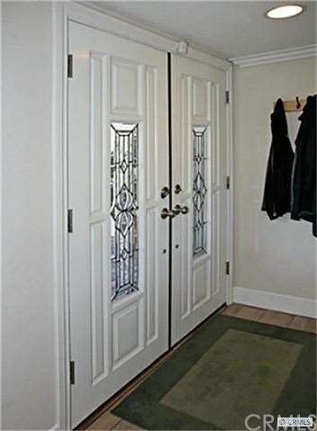 Custom double-door entry with beveled glass