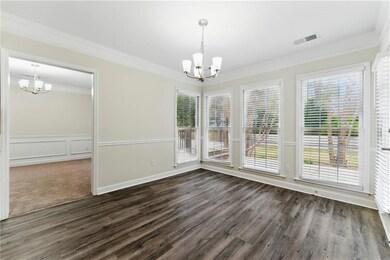 Unfurnished dining area featuring a notable chande