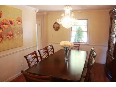 Dining Room. Chair rail, crown, hardwood floors