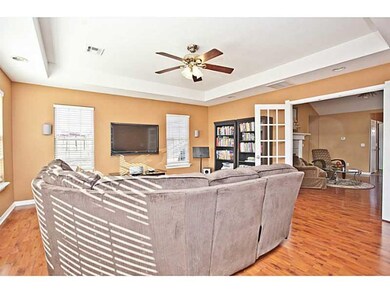 Den/Family/Great Room. French Doors Separate Family Room from Living