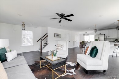 Living room featuring dark hardwood / wood-style f