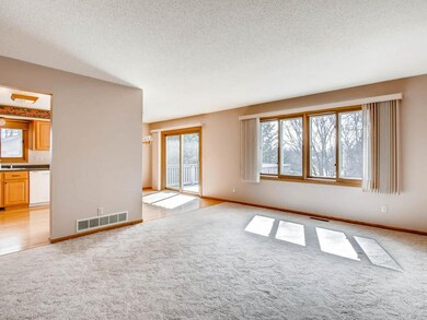 Living room looking toward dining room and kitchen