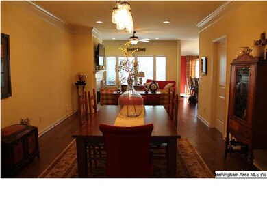 Walk in to be greeted by hardwood floors and a flo