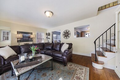 Opens to dining room, kitchen.