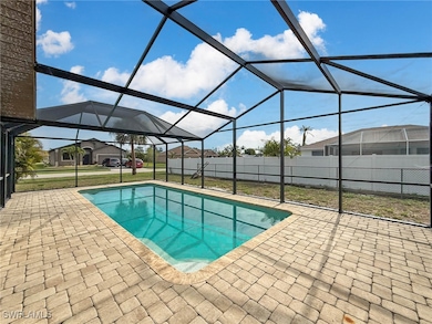 View of swimming pool with a patio area and a lana