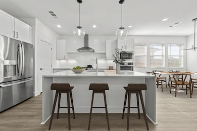 Kitchen with pendant lighting over island