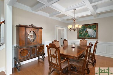 Formal dining room with entryway to kitchen