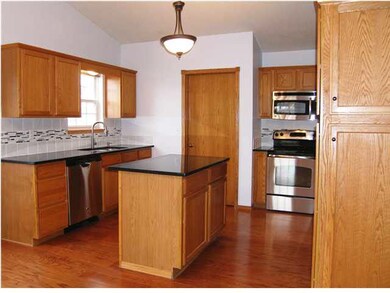 The kitchen as viewed from the dining. The pantry 