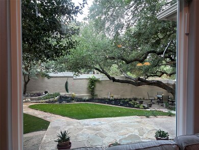 Fenced backyard featuring a patio