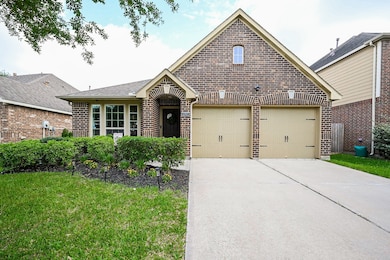 This charming brick home features a two-car garage