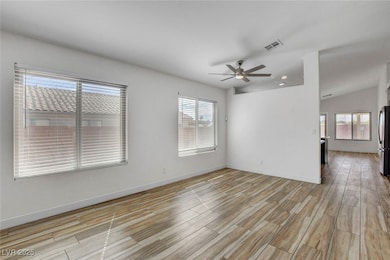 Unfurnished room featuring wood tiled floors, recessed lighting, and ceiling fan