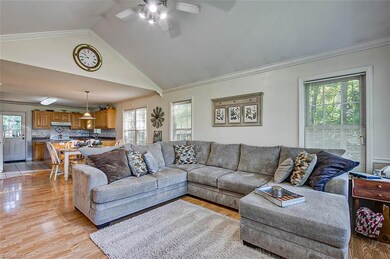The high ceilings make this open concept living area feel even more spacious.