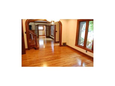 To the left of the main foyer, and through another