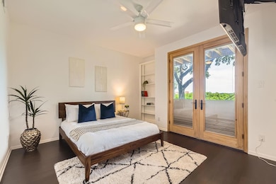 Bedroom with access to outside, dark wood-style f