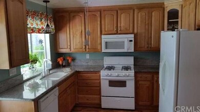 updated kitchen with granite counters and bay window