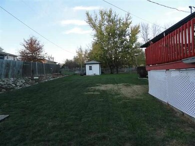 Large backyard with storage shed