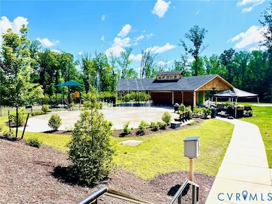 View of home's community with a patio