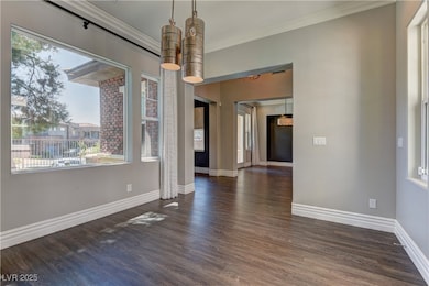 Unfurnished dining area with crown molding, plenty
