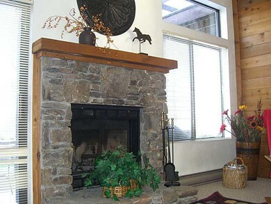 Living Room. Wood burning fireplace with  stone fa